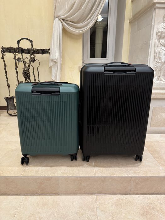 American tourister мала та снредня нові валізи