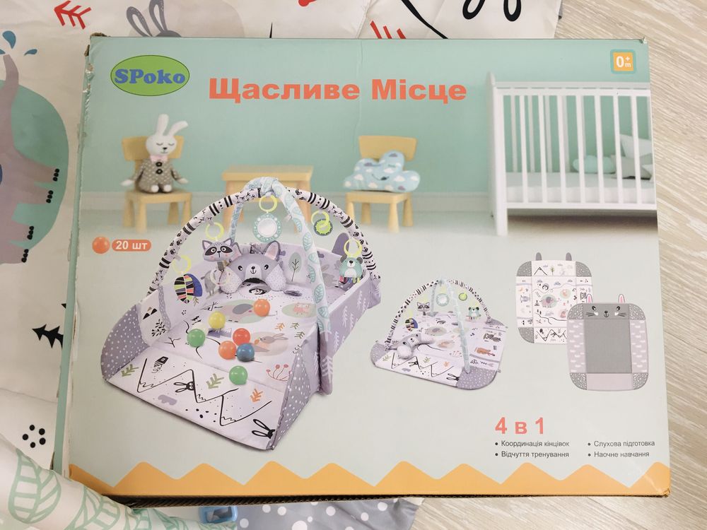 Інтерактивний розвиваючий килимок з навісними іграшками Ricokids