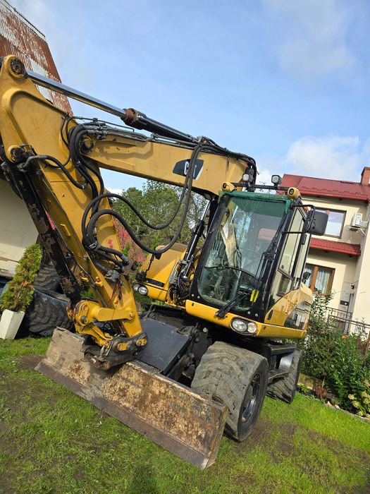 Sprzedam koparke kołową catepillar 313D