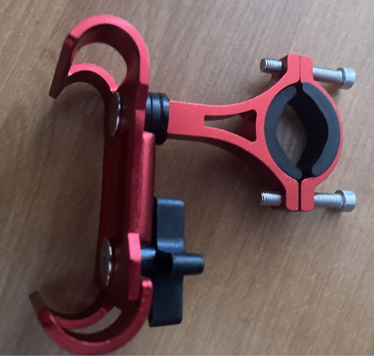 Uchyt na kierownice wozka dzieciecego lub kierownice roweru