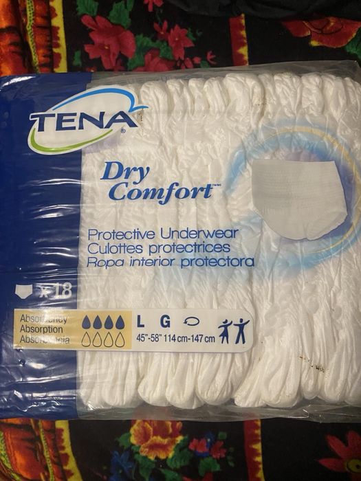 Памперси нові , Tena розмір L