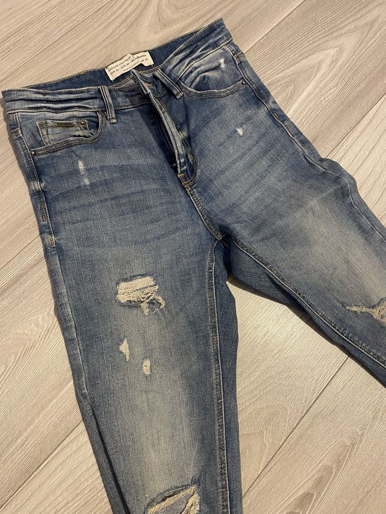 Jeansy regular high waist