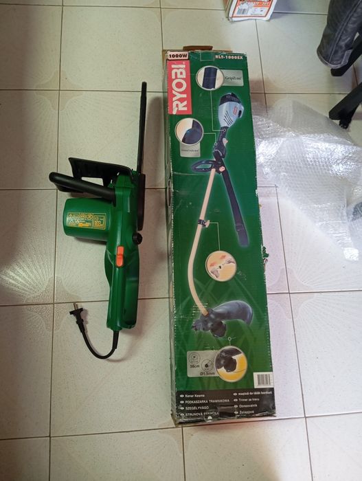 Motoserra e aparador de relva nova