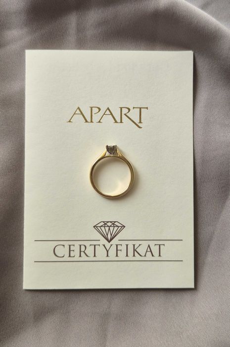 Złoty pierścionek Apart 585 z 7 diamentami i certyfikatem