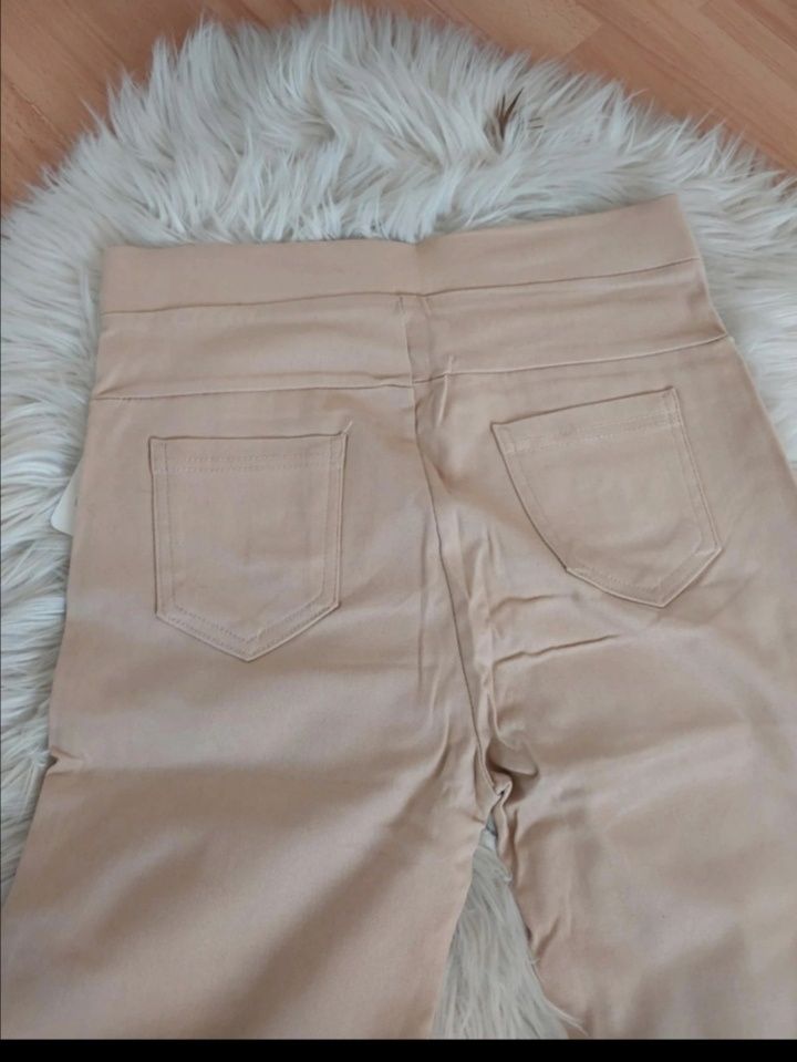 Eleganckie spodnie beżowe guziki legginsy ML