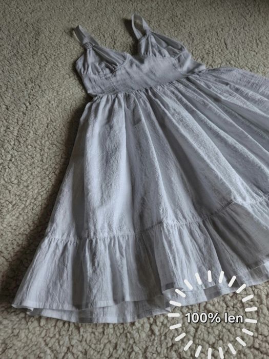 Biała lniana sukienka letnia elegancka