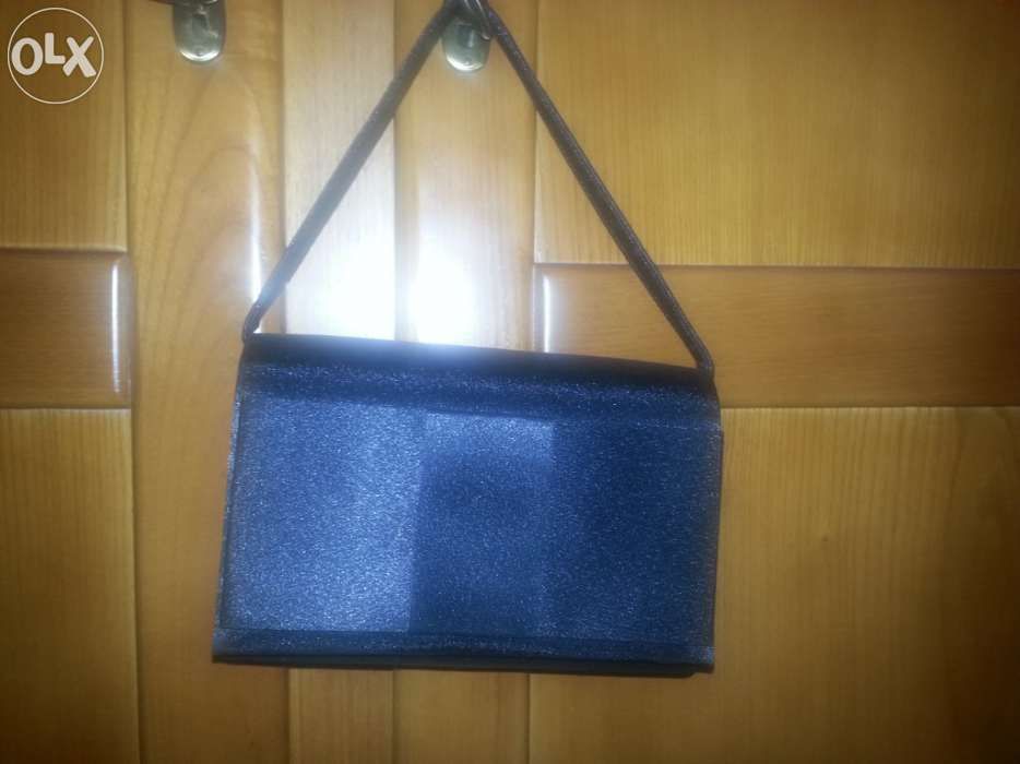 Clutch Preta Claire's_Nova