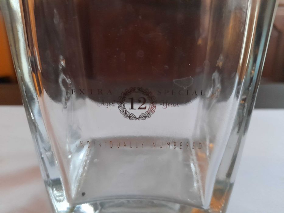 Stara, kolekcjonerska butelka po whisky