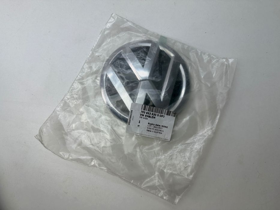 VW T5 Lift T6 Emblemat klapy Tył Nowy Oryginał 7E0853630D
