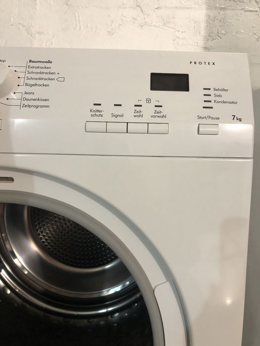 сушильна компресорна машина для білизни AEG