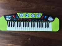 Instrumento musical infantil: órgão e piano mini