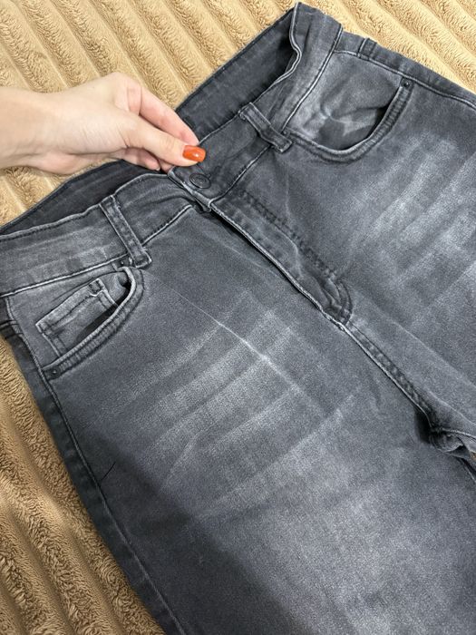 Джинси кльош чорні М 38