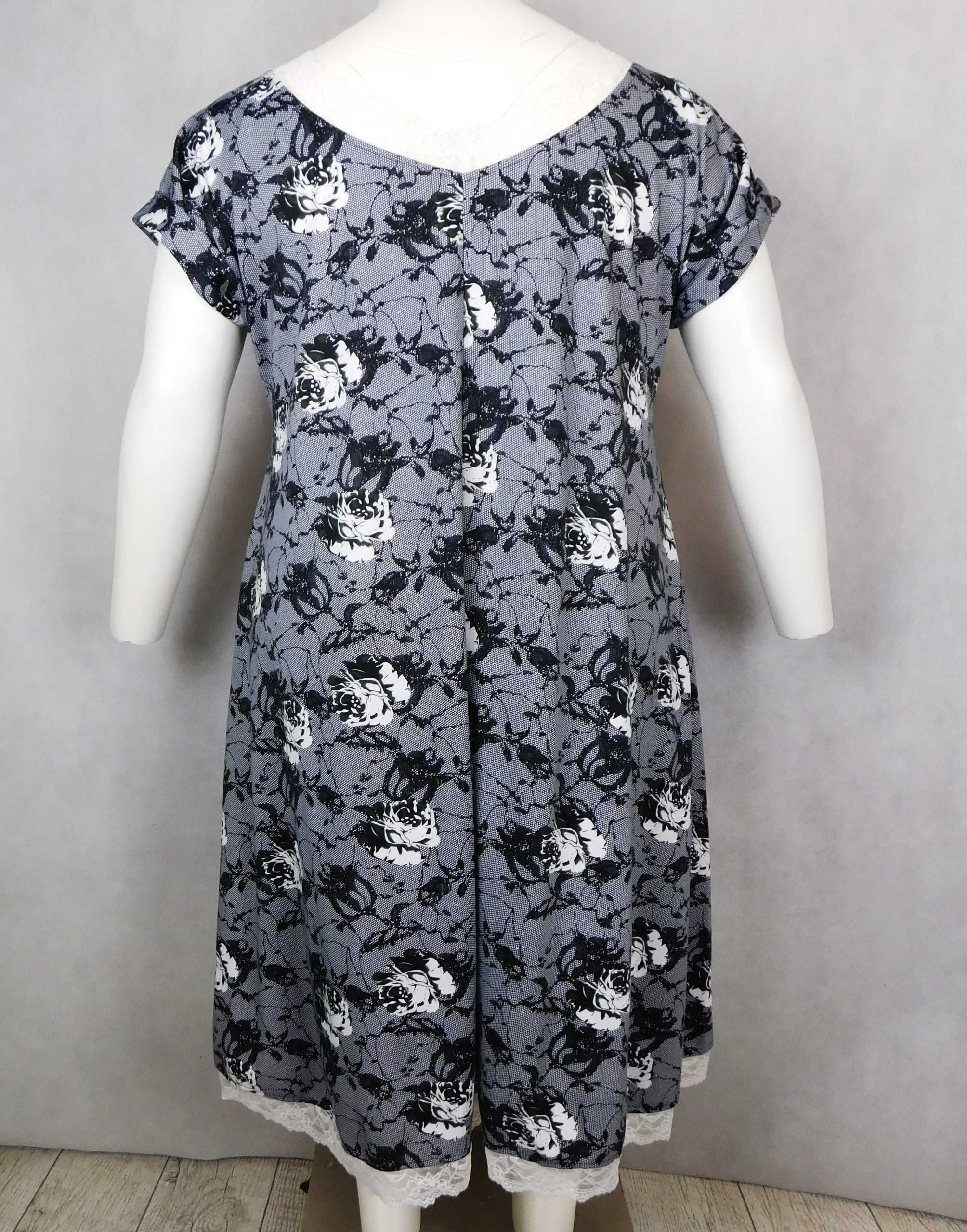 Sukienka elegancka z kieszeniami imitacja koronki XXXL - 60/62