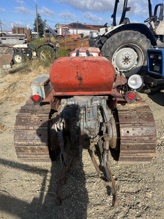 Trator rastos mf 174c usado