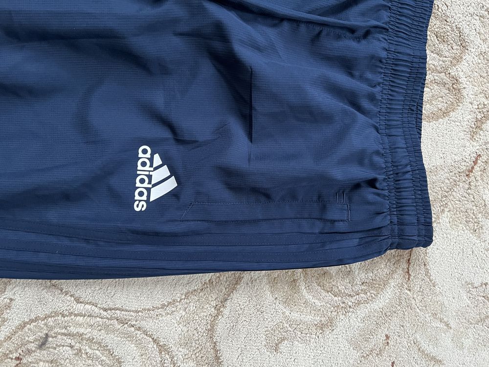 Штани adidas M колір синій