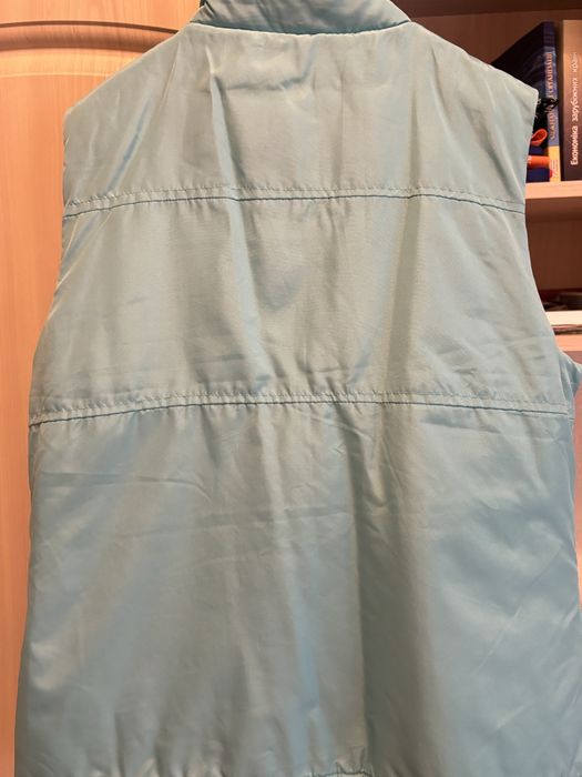 Жилетка блакитного кольору