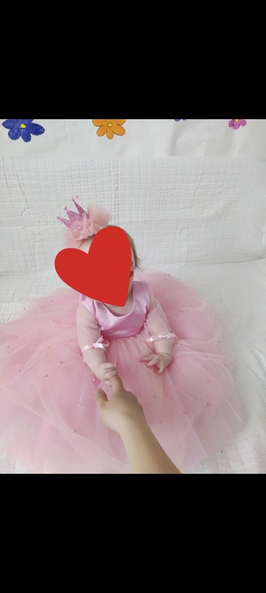 Рожева сукня з бантом