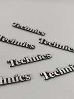 Technics Logos metálicos
