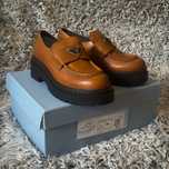 Prada double chocolate leathers loafers