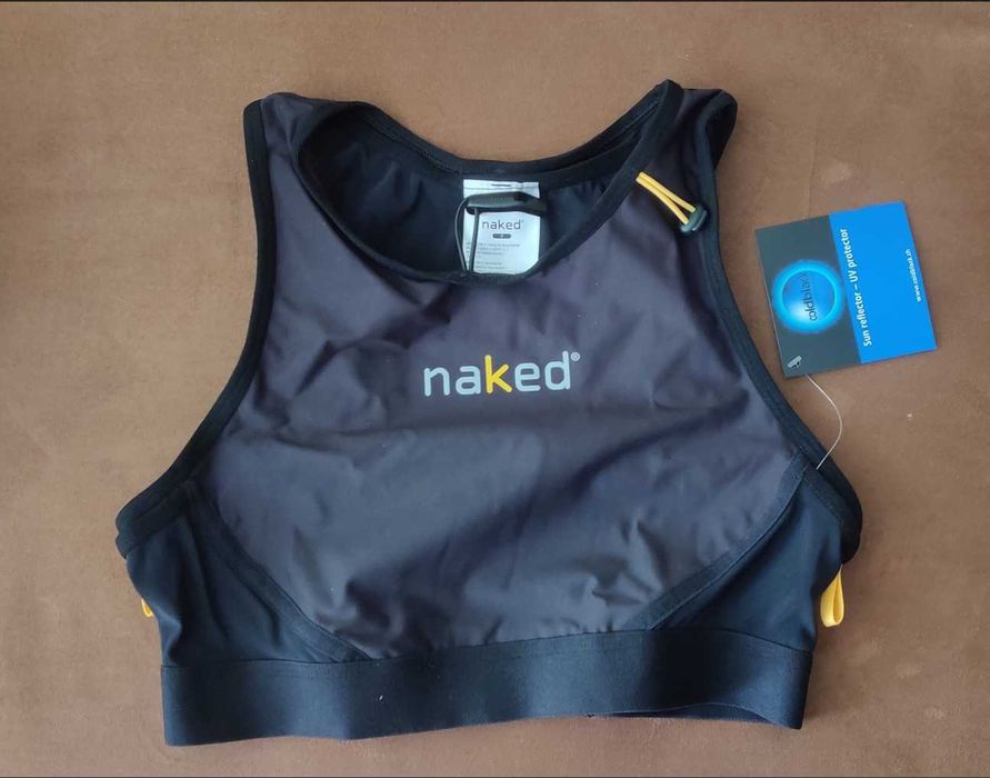 Жилет для бега и занятий активными видами спорта.. Женский.