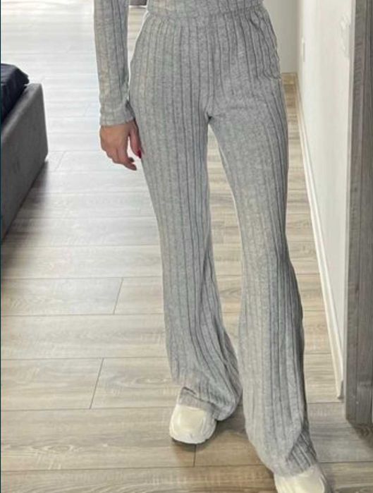 Штани кльош в рубчик сірі