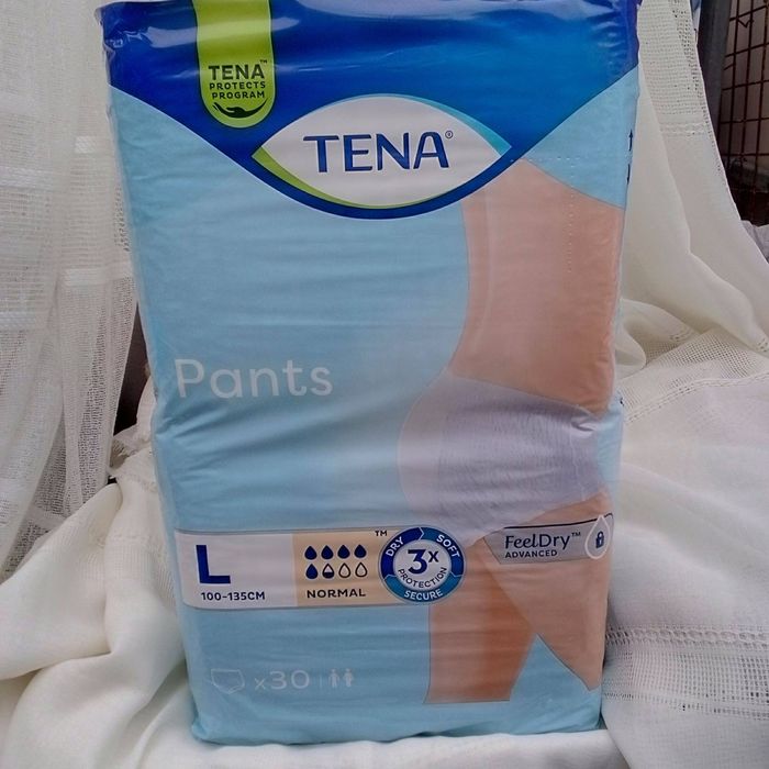 Продам Памперси Tena, id slip