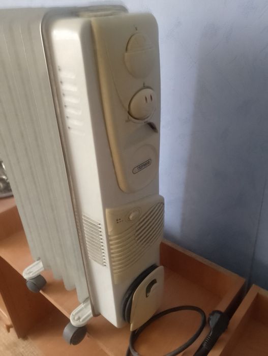 Масляний обігрівач