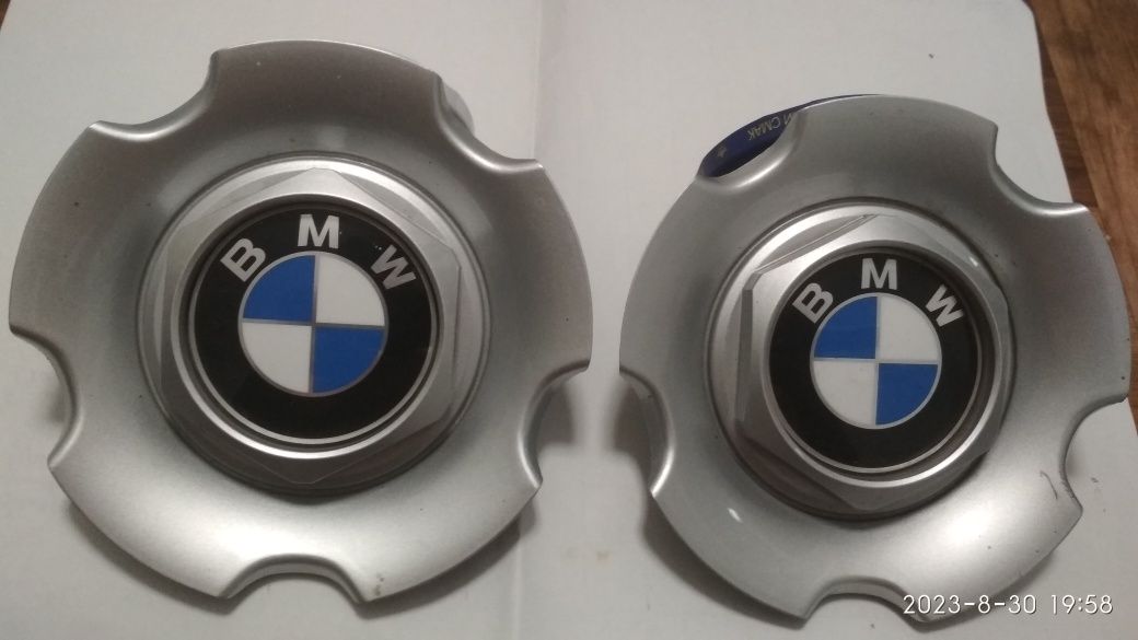 Колпачки на колёса BMW .