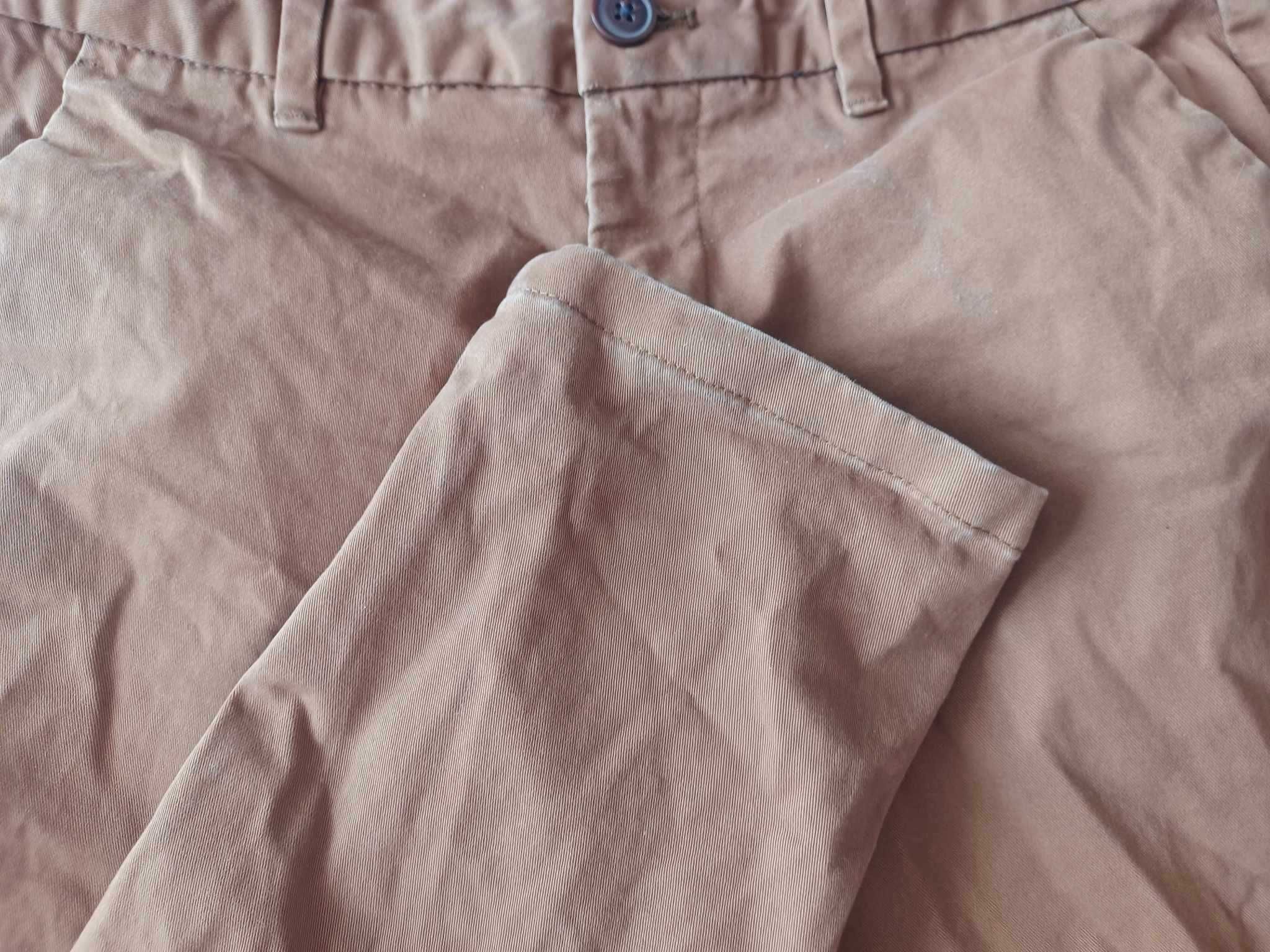 Długie bawełniane spodnie męskie NEXT 30 (S/M) slim fit / musztardowe