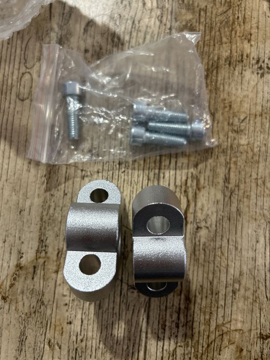 Extensor universal para guiador moto