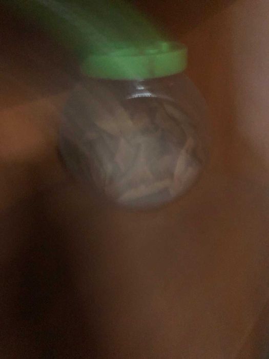 pote de armazenamento de vidro com tampa verde