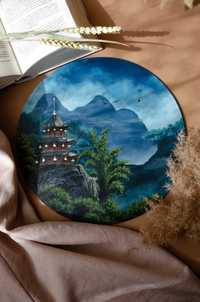 Кругла картина "Гірська перлина Азії"