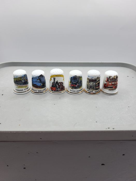 Zestaw 6 naparstków z środkami transportu