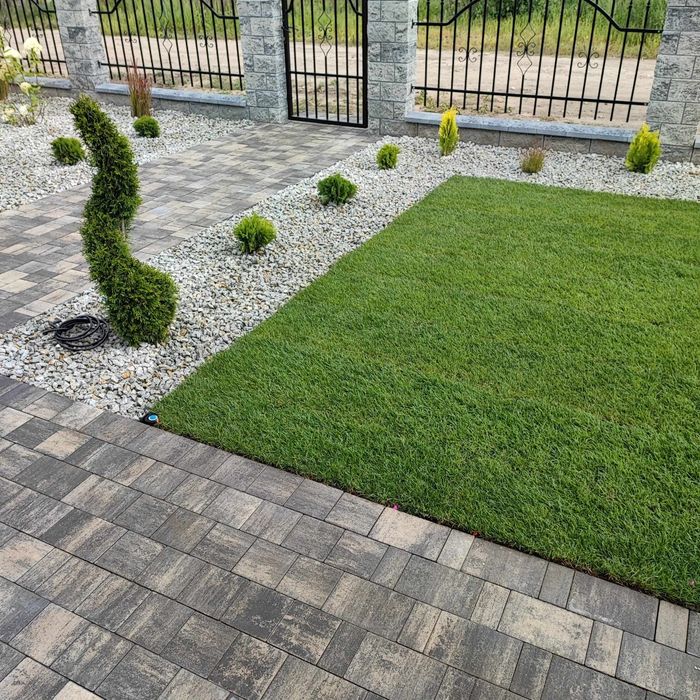 Zakładanie ogrodów systemu nawadniania montaż ogrodzeń.