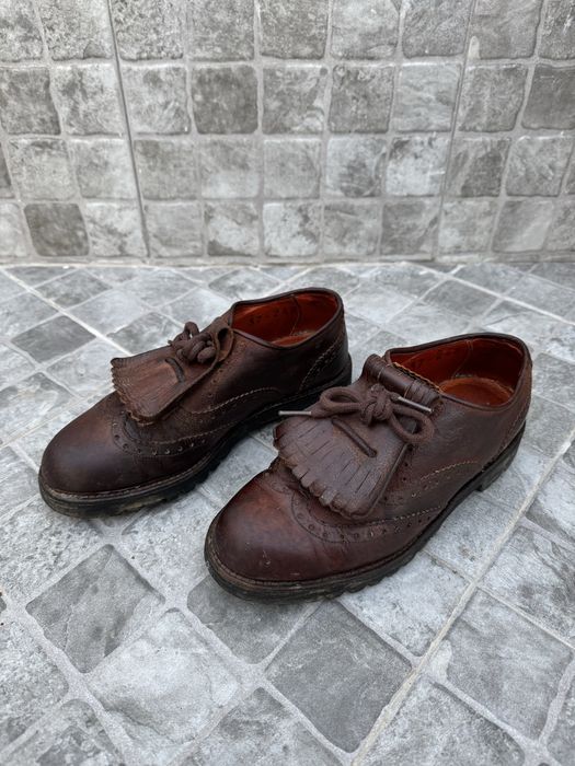 Sapatos de forcado em pele