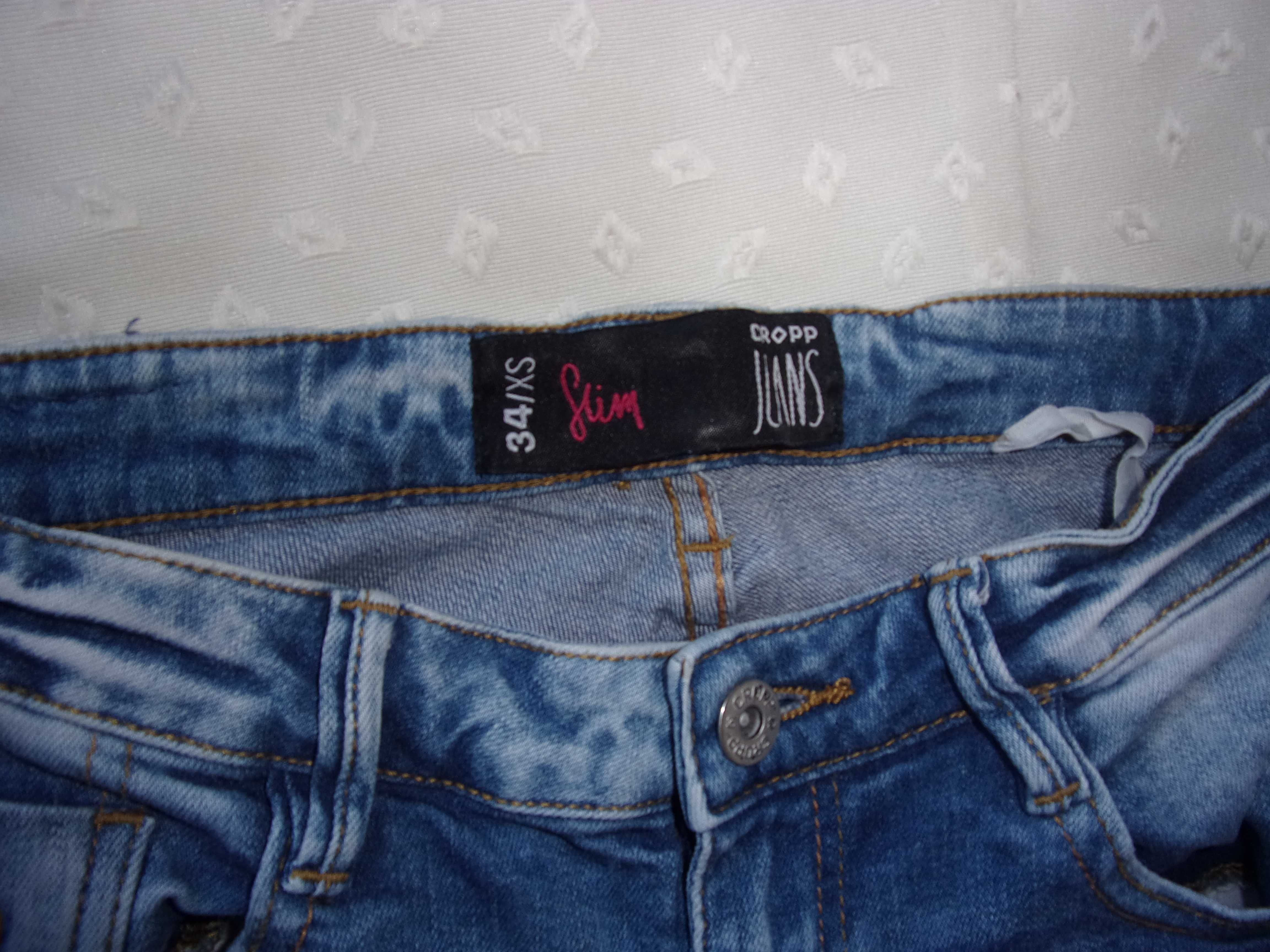 jeansy damskie dziewczece CROPP 34 / XS - slim - z dziurami