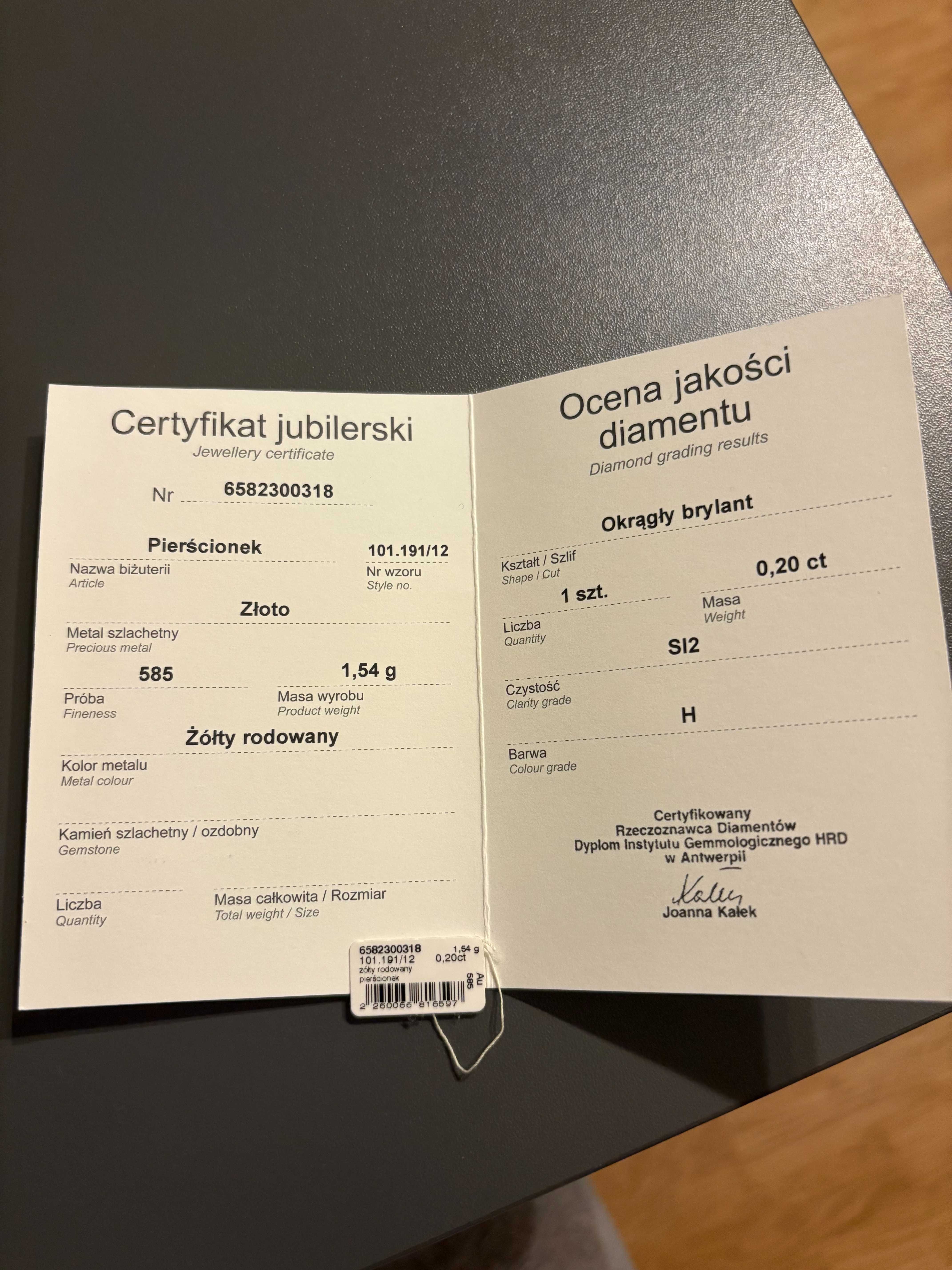 Pierścionek zaręczynowy z żółtego złota z brylantem