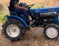 Trator Iseki TX1300, e destroçador / capinadeira