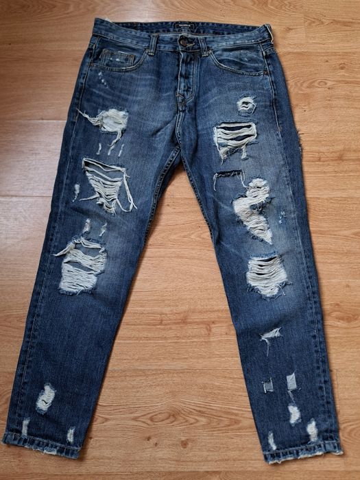 Dżinsy z przetarciami Pull&Bear custom drip drill granatowe