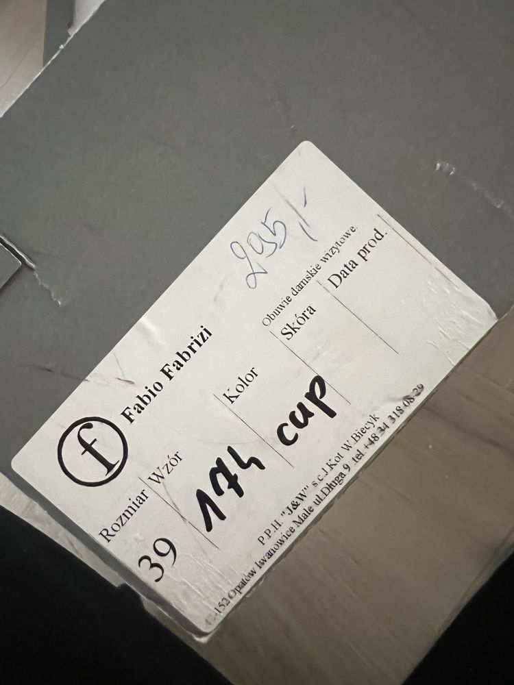 Skórzane botki z futerkiem na obcasie