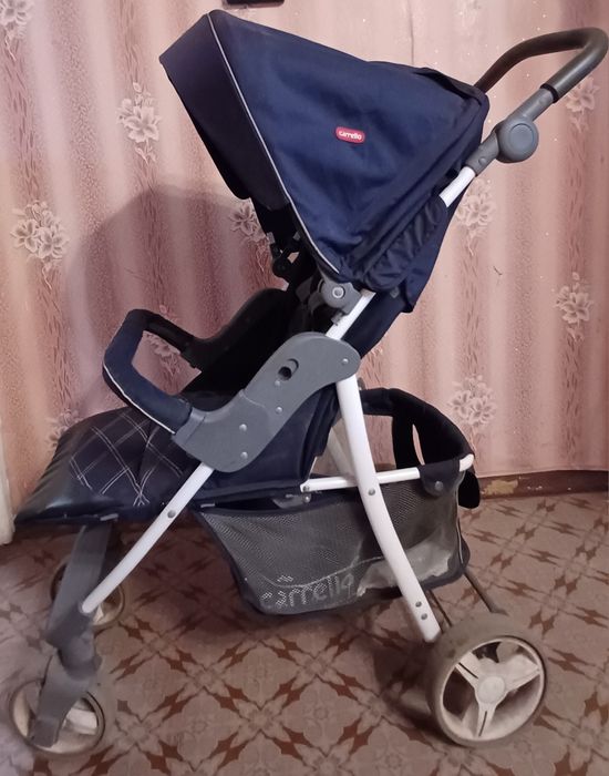 Продам коляску Carrello Quattro тёмно-синего цвета с дождевиком