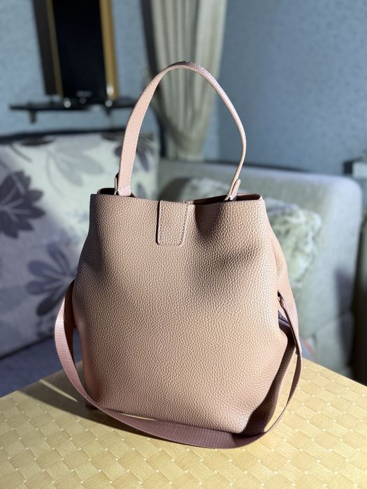 Жіноча сумка OCHNIK рожева з ремінцем