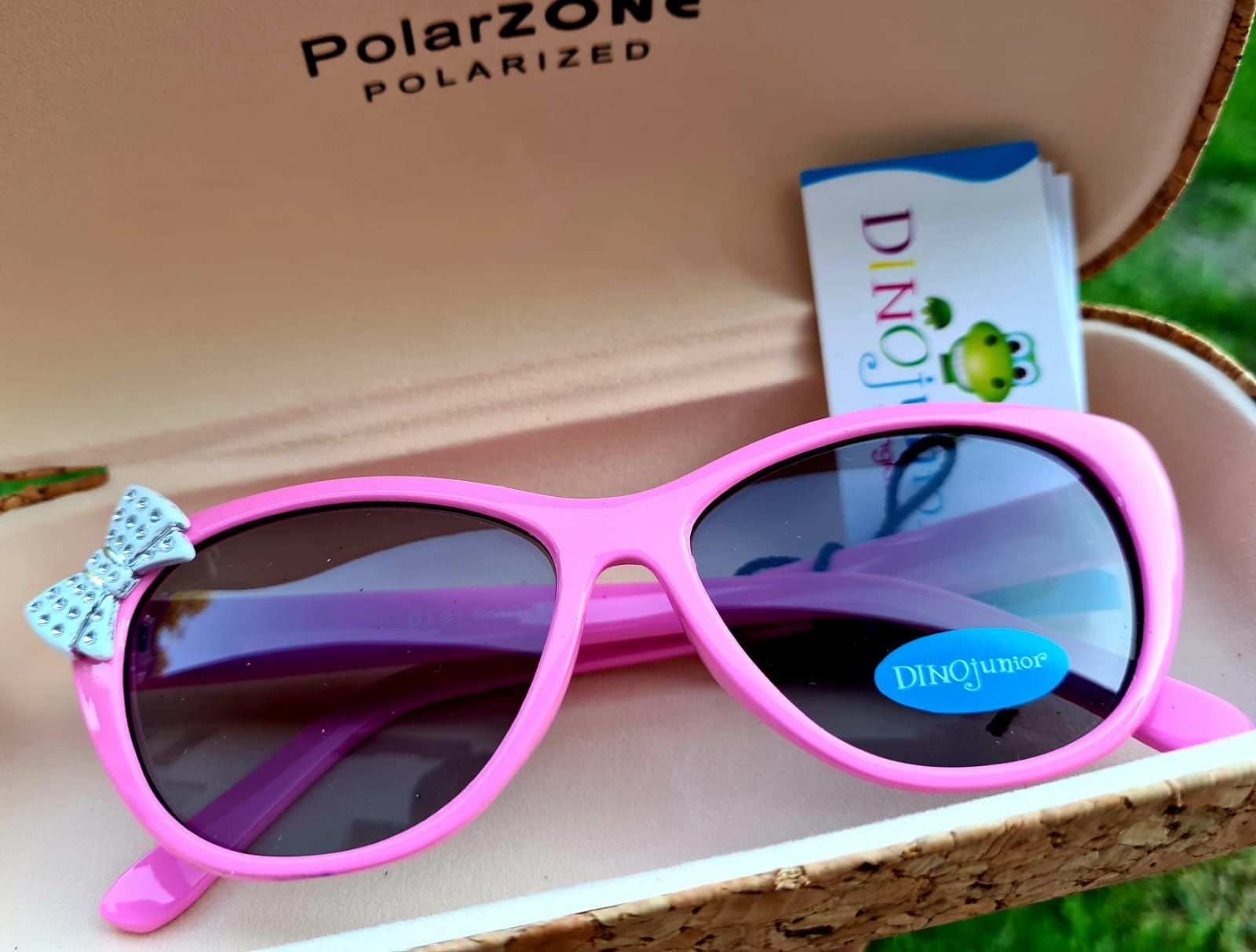 Nowe okulary przeciwsłoneczne dla dziewczynki DinoJunior różowe