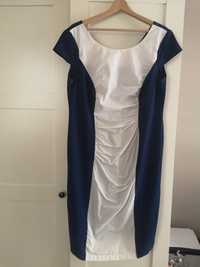 Granatowa elegancka sukienka z białym elementem 46