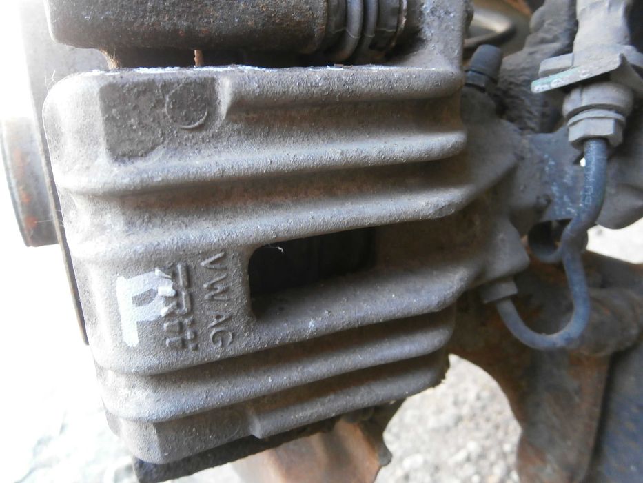 vw passat B5 FL 1,9 tdi zacisk hamulcowy lewy prawy tył