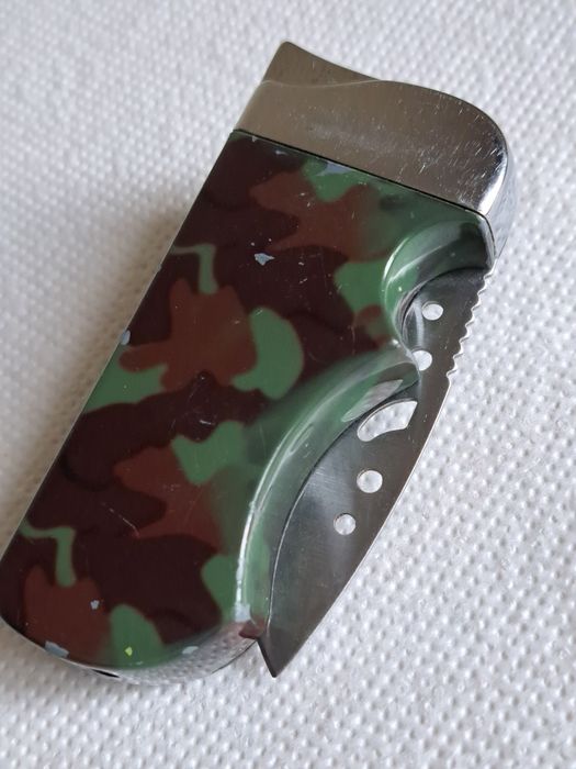 Продам зажигалку