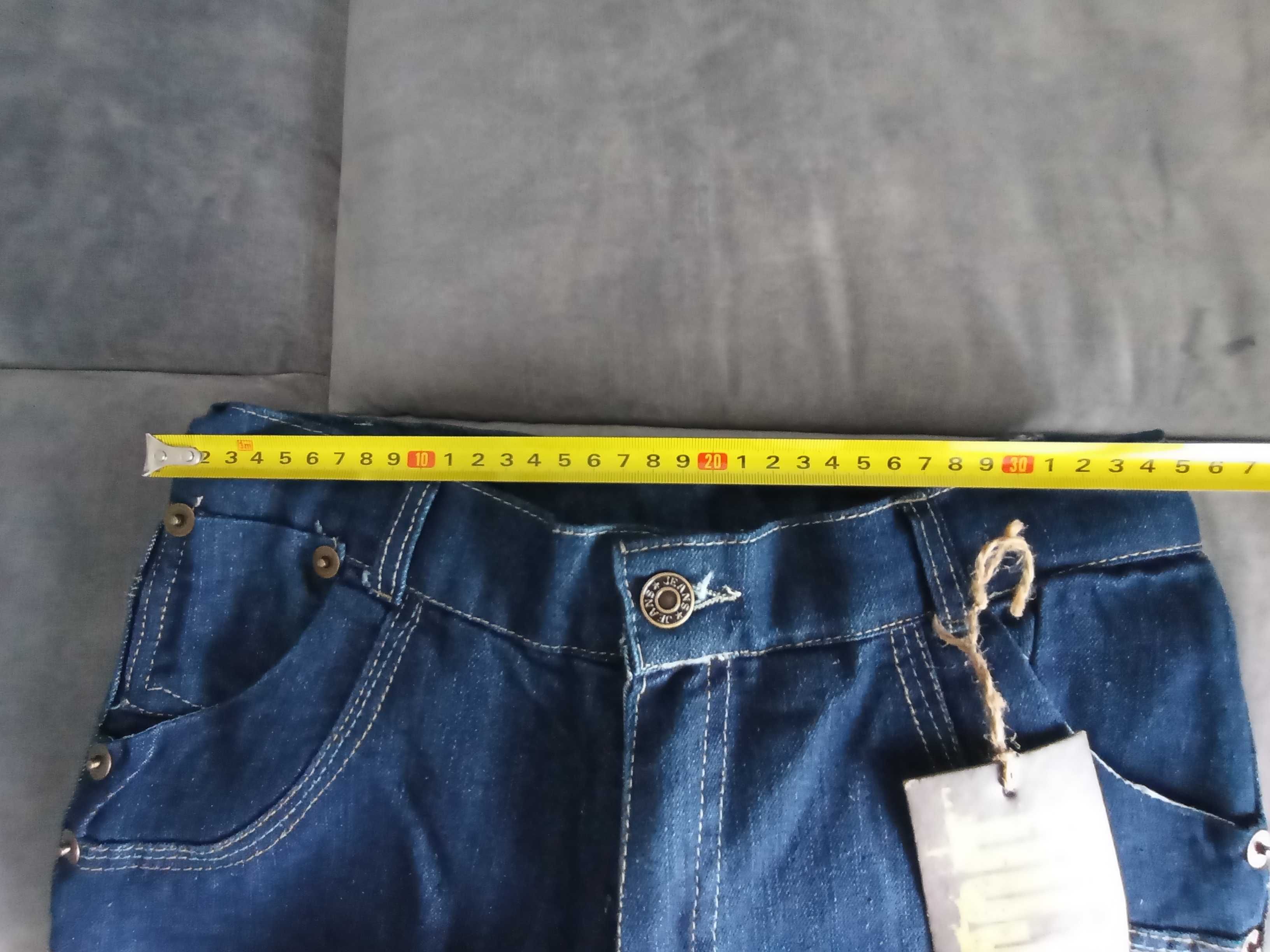 Sprzedam nowe spodnie jeans ocieplane dla dziewczynki rozmiar 158