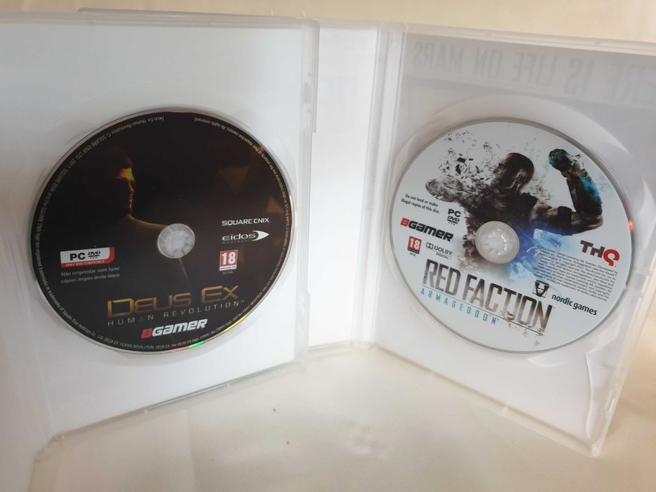 2 Jogos de PC-DVD : Red Faction + Deus Ex