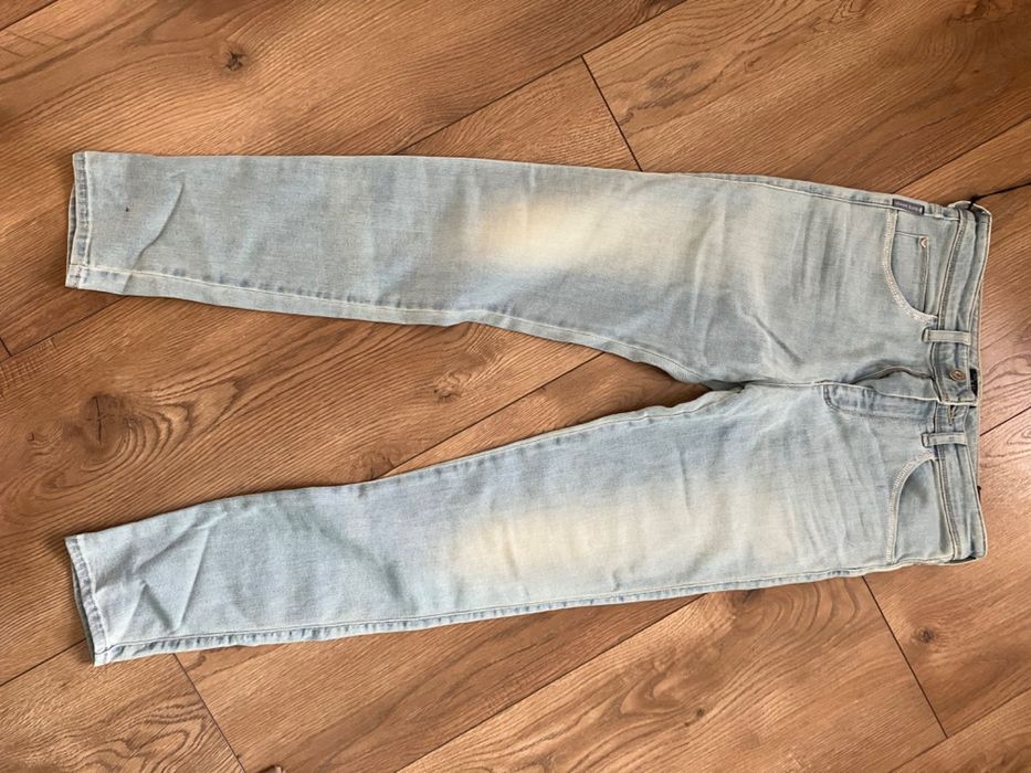 Jeansy Armani niebieskie