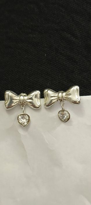 Brincos laço em prata